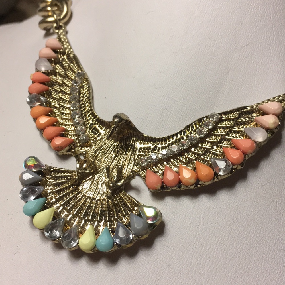 Goldtone with with a eagle symbol Pendant